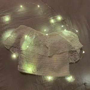 A cropped white tube top